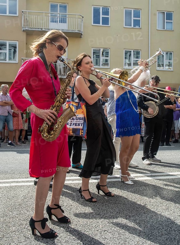 Jazz musicians, The Carling family, play on the street in Ystad in the opening of the Ystad Jazz Festival 2024, Skane County, Sweden, Scandinavia, Europe
