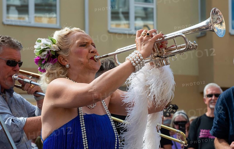 Jazz musicians, The Carling family, play on the street in Ystad in the opening of the Ystad Jazz Festival 2024, Skane County, Sweden, Scandinavia, Europe