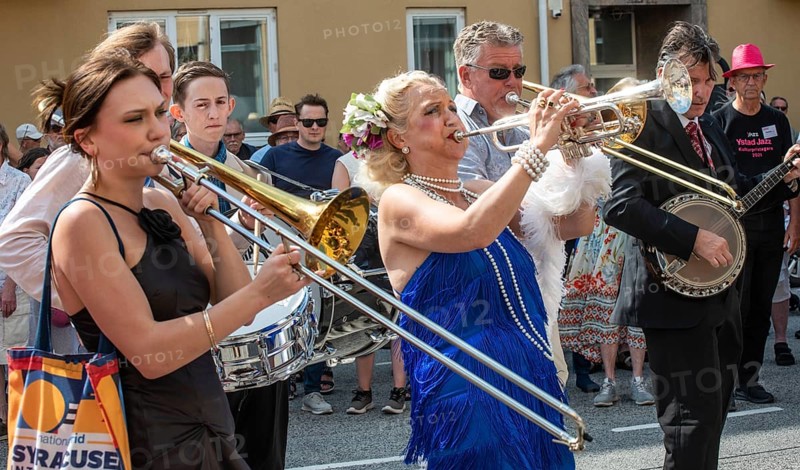 Jazz musicians, The Carling family, play on the street in Ystad in the opening of the Ystad Jazz Festival 2024, Skane County, Sweden, Scandinavia, Europe