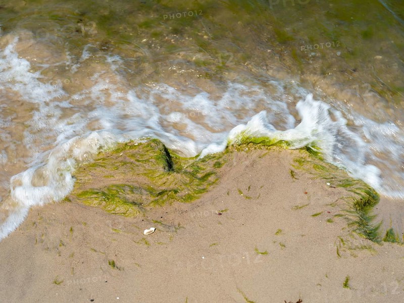 Water flowing onto the sandy beach on the island of Usedom on the Baltic Sea, Zempin, Mecklenburg-Vorpommern, Germany, Europe