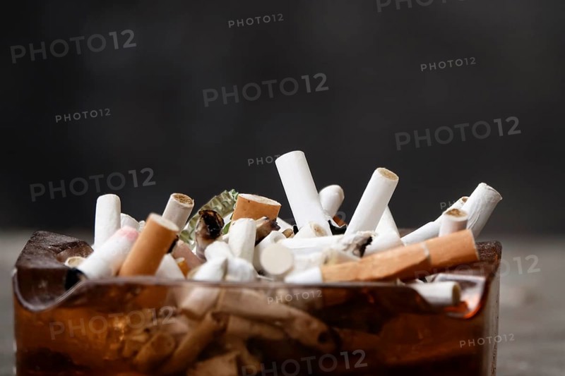 Ashtray with cigarette butts, Germany, Europe