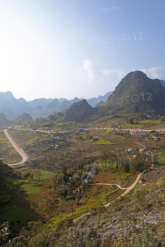 Road and karst hills in the Dong Van Karst Plateau UNESCO Global Geopark, Ha Giang Province, Vietnam, Asia