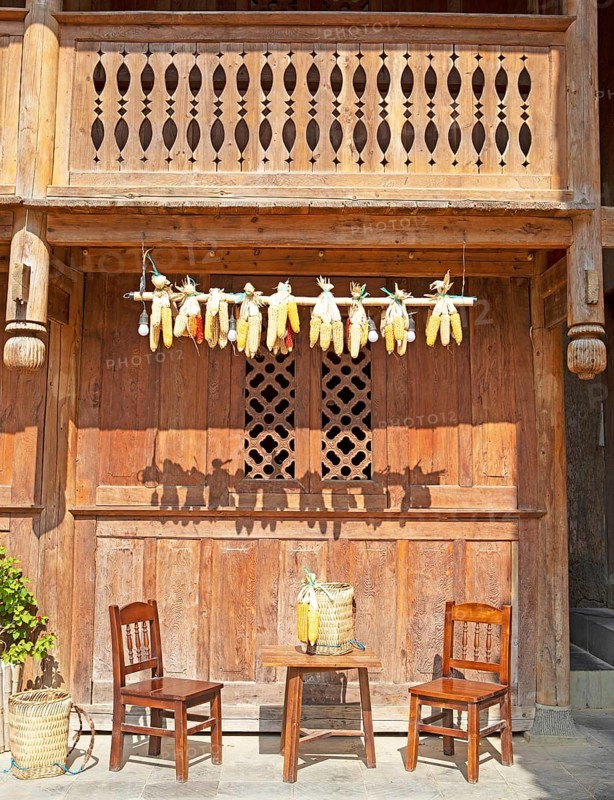 Corn on the corn cob hanging from a traditional house, Pa Vi Hmong Cultural Village, Meo Vac, Ha Giang province, Vietnam, Asia