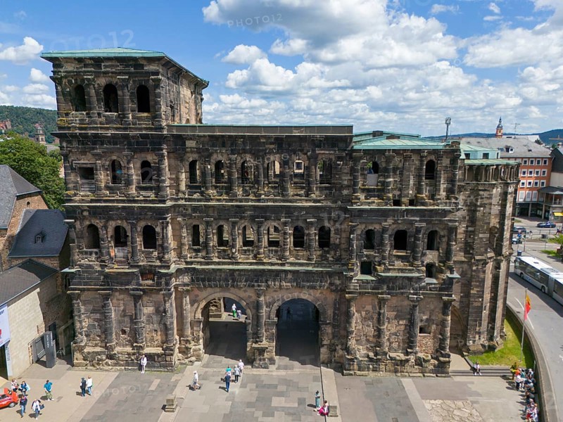 Historical architecture with detailed masonry, Porta Nigra in Germany in sunny summer weather, aerial view, Porta Nigra, Black Gate, Roman city gate, Trier, Rhineland-Palatinate, Germany, Europe