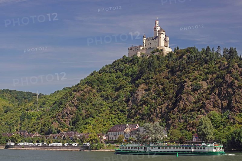 A castle on a green hill, on the bank of a river, with a ship in the foreground, Middle Ages, Marksburg, Rhine, Rhineland-Palatinate, Germany, Europe
