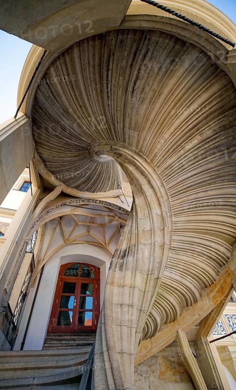 Bottom view of the famous cantilever staircase GroÃŸer Wendelstein in Hartenfels Castle, Torgau, Saxony, Germany, Europe