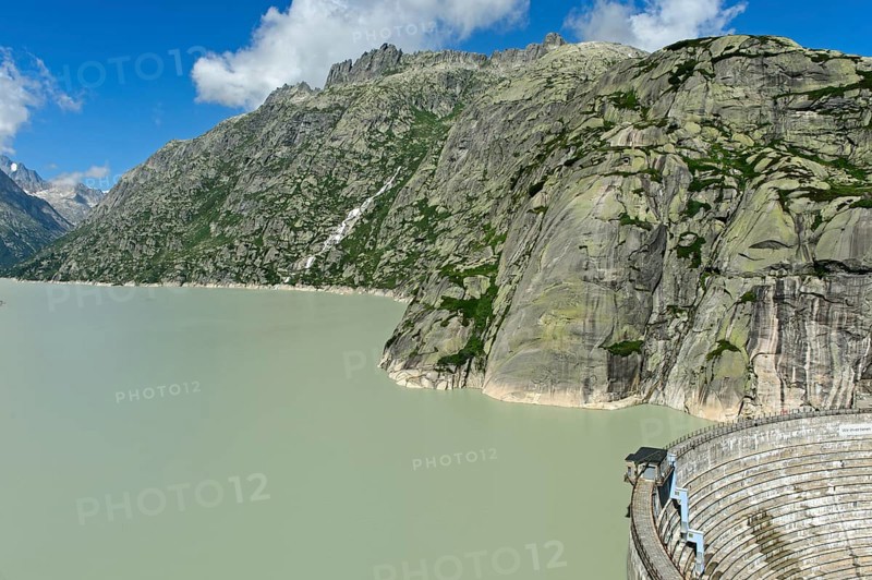 The well-filled Grimselsee reservoir with the Spitallamm wall, Guttannen, Canton Bern, Switzerland, Europe