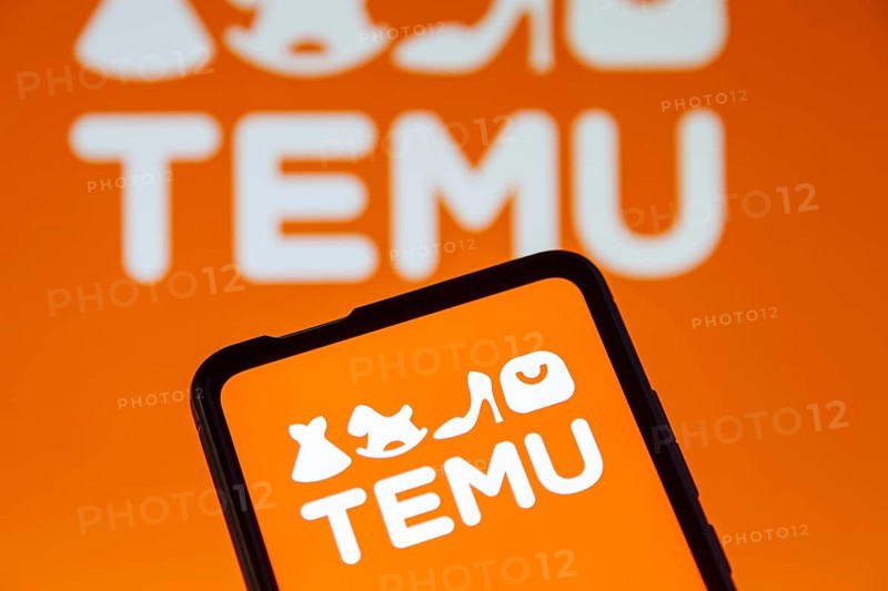 Temu logo online marketplace online trading ecommerce on a mobile phone and computer screen
