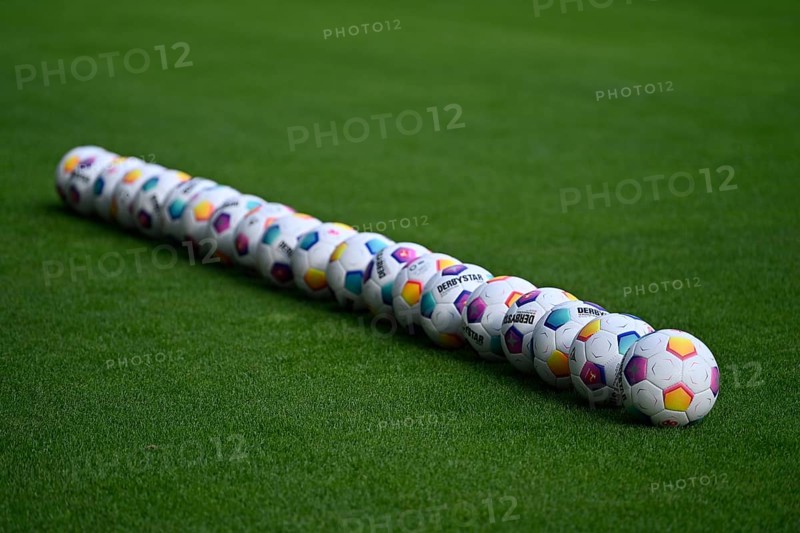 20 Adidas Derbystar match balls lie on grass, PreZero Arena, Sinsheim, Baden-Württemberg, Germany, Europe