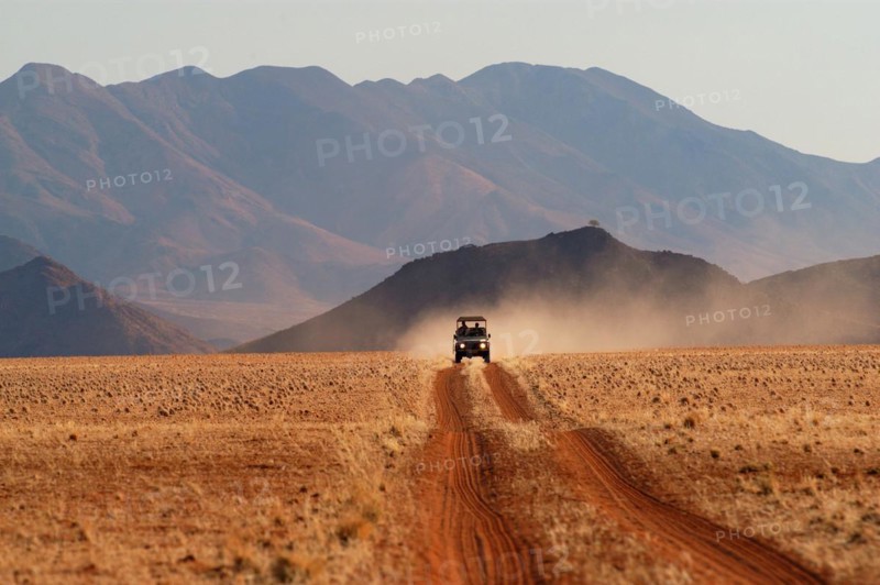 A jeep in the landscape, Namibia, Africa