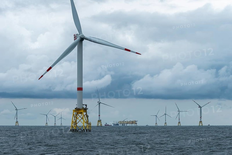 Offshore wind farm Nordsee Ost, operator RWE, north of Helgoland, German economic zone, wind turbines with jacket foundation structure, low swell, supply station, ship tug, Germany, Europe