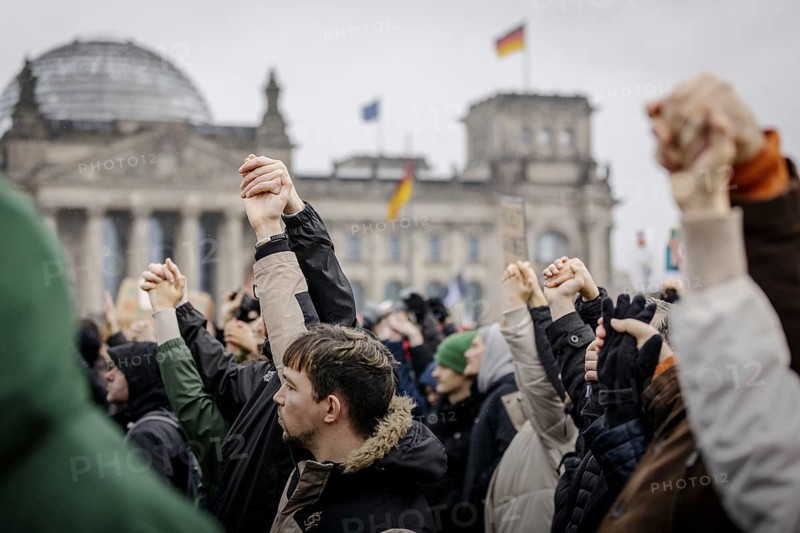 People hold hands at the large demonstration against the right in Berlin under the slogan We are the firewall . Recorded in Berlin, 03.02.2024