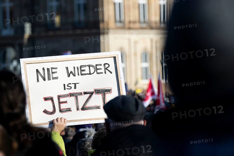 Pictures taken during the demonstration Haltung zeigen! against Nazi deportation plans of the AfD on the Schlossplatz in Stuttgart, 20.01.2024. A sign with the inscription Nie wieder ist jetzt