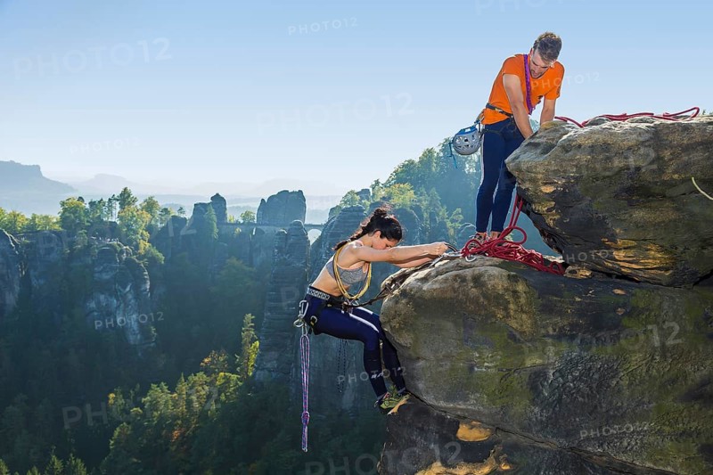 Climbers in Rathen in Saxon Switzerland