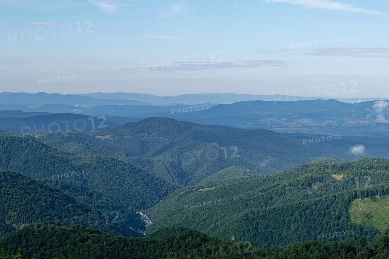 View of the Apuseni Mountains in the Western Carpathians from the viewpoint on the Romanian DN 75 near Vartop. Alba County, Transylvania, Romania, Southeast Europe, Europe