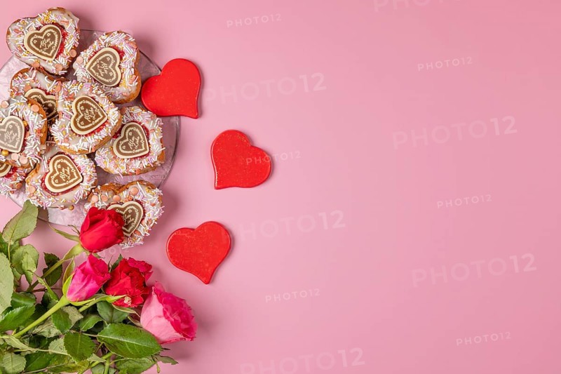Heart-shaped cupcakes, red hearts and roses, Valentine's Day, pink background