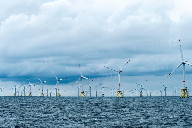 Offshore wind farm Nordsee Ost, operator RWE, north of Helgoland, German economic zone, wind turbines with jacket foundation structure, low swell, supply station, ship tug, Germany, Europe