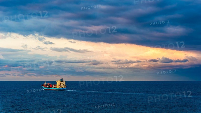 Maersk Line Container Ship on sea at sunrise, Barcelona, Spain, Europe