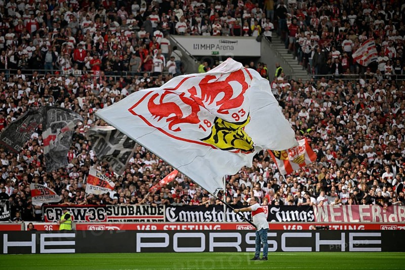 Flag wavers, VfB Stuttgart logo, in front of Cannstatter Kurve fan block, Porsche perimeter advertising, MHPArena, MHP Arena Stuttgart, Baden-Württemberg, Germany, Europe
