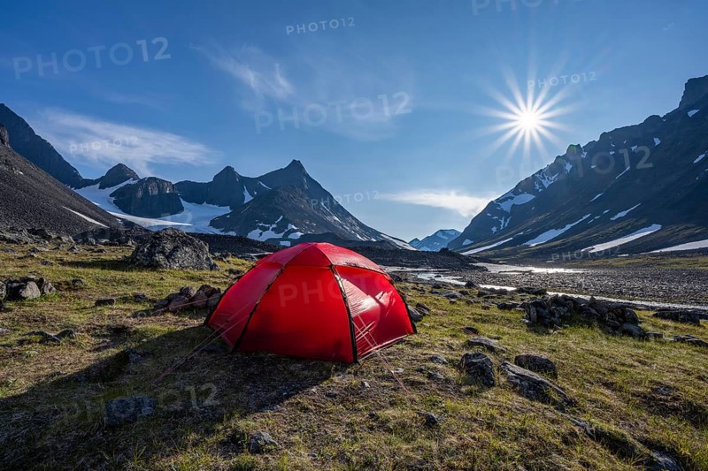 Red tent in Kaskasavagge valley, Kaskapakte glacier and mountains, mountain Kaskasatjakka and Kuopertjakka, river Gaskkasjohka, Kebnekaise massif, Lapland, Sweden, Europe