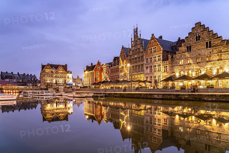 Medieval guild houses of Graslei Kai on the river Leie at dusk, Ghent, Belgium, Europe