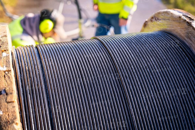 Detailed view of the cable spool on a machine reel with focus on the cables, fibre optic construction, Nagold, Black Forest, Germany, Europe