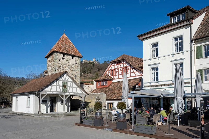 The Hexenturm, in the historic old town of Stein am Rhein, used as a prison until around 1800, in front of it a street café, behind it Hohenklingen Castle, Canton Schaffhausen, Switzerland, Europe