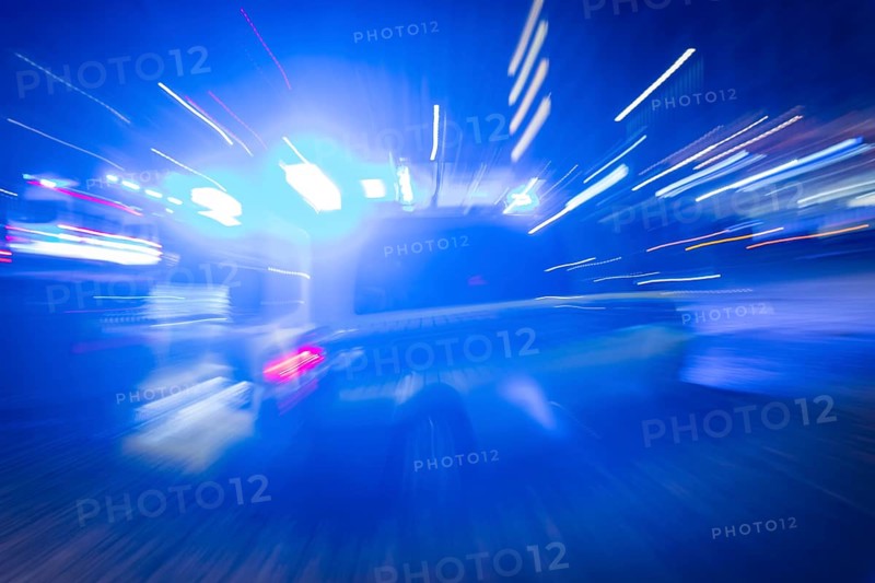 A police vehicle in action, with blue light switched on, Dresden, Saxony, Germany, Europe