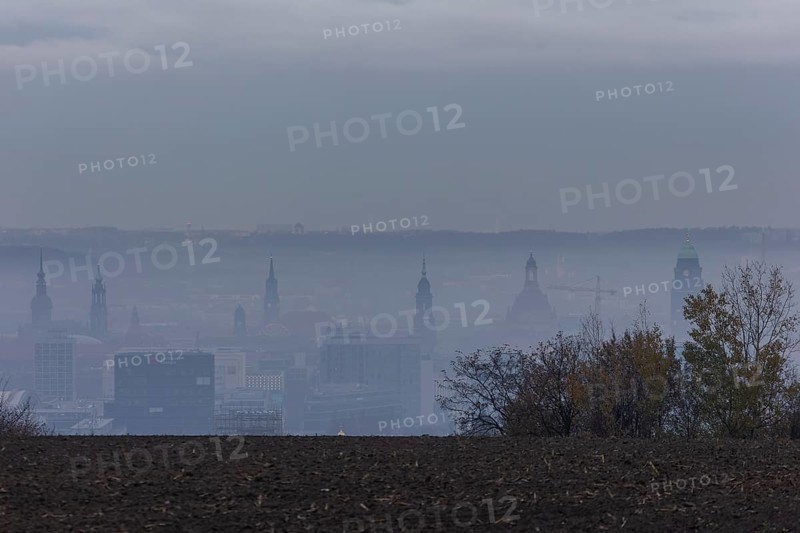 View from Dresden's Südhöhe of the city centre with its towers sinking into the fog
