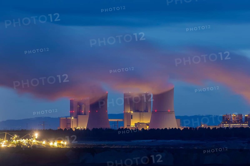 The Nochten open-cast mine (Upper Sorbian: WochoÅ¾anska jama) is an open-cast lignite mine in northern Upper Lusatia operated by Lausitz Energie Bergbau AG (LEAG) . Up to 18 million tonnes of lignite are mined annually in the Nochten opencast mine. Stacker in front of the silhouette of the Boxberg power plant