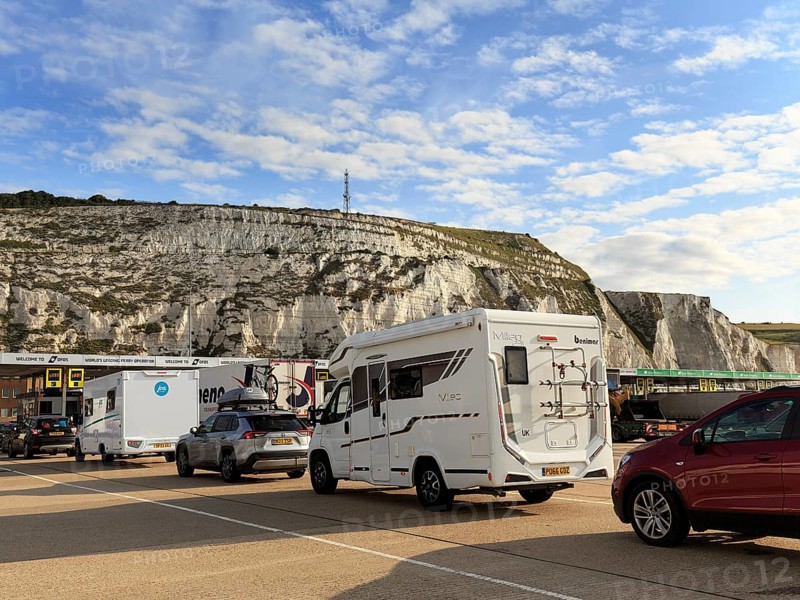 Cars and motorhomes waiting at the ferry terminal, chalk cliffs, Dover, Kent, England, United Kingdom, Europe