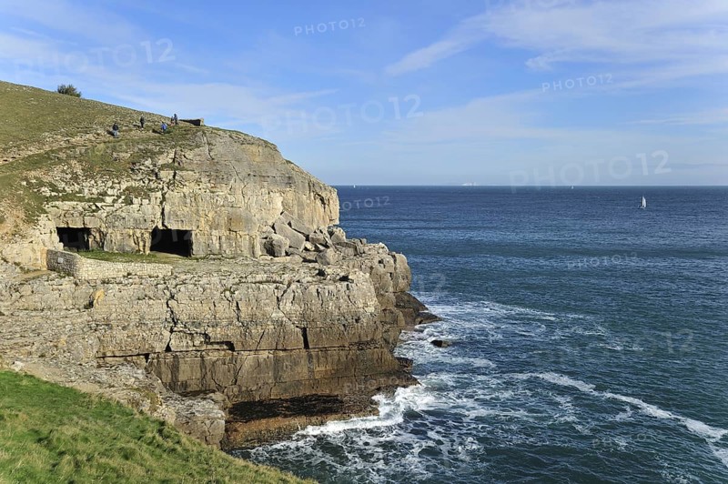 Tilly Whim quarry and caves at Anvil Point, Durlston Head on the Isle of Purbeck along the Jurassic Coast in Dorset, southern England, UK