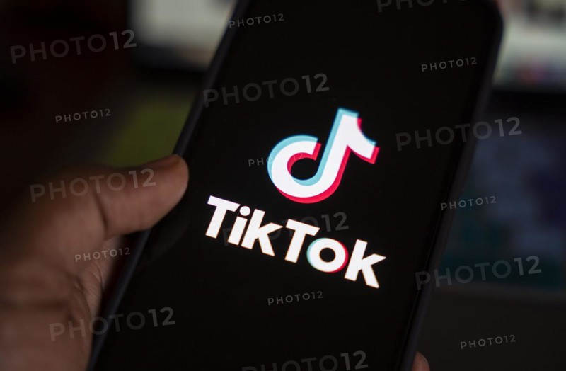 In this photo illustration, logo of Tiktok is displayed on mobile phone screen next to ban sign, in Guwahati, India 25 April 2024. US President Joe Biden signs law to ban Chinese-owned TikTok unless sold to US company