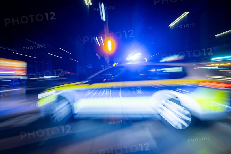 A police vehicle in action, with blue light switched on, Dresden, Saxony, Germany, Europe