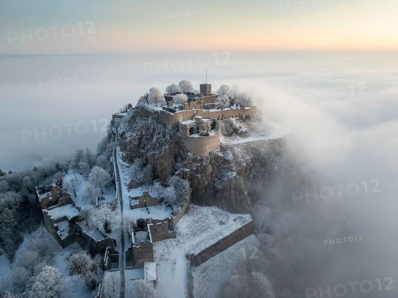 Aerial view of the Hegau volcano Hohentwiel with Germany's largest fortress ruins on a cold, foggy winter morning, in front of sunrise, Singen am Hohentwiel, district of Constance, Baden-Württemberg, Germany, Europe