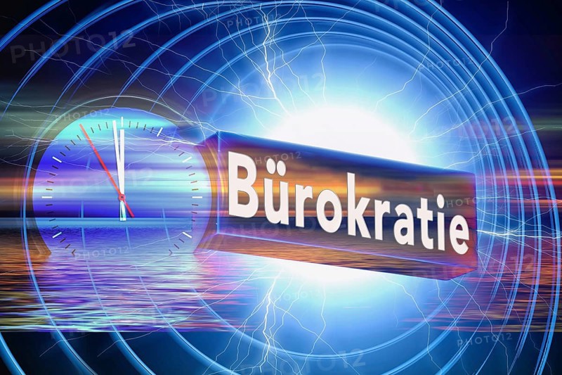 Symbolic image, one to twelve bureaucracy, inefficiently cumbersome, expensive approval procedures for investments, complicated laws, digitalisation of administration, confusing paths, outdated processes, dusty authorities, business-to-government market, old-style offices, antiquated filing systems, analogue printouts, paper chaos, outdated IT systems, future fields of data processing, Germany digitally backward