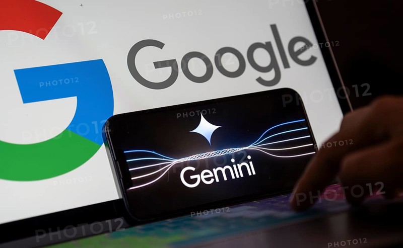 Guwahati, India. 8 December 2023. In this photo illustration a Gemini logo is displayed on a smartphone with Google logo displayed in the background