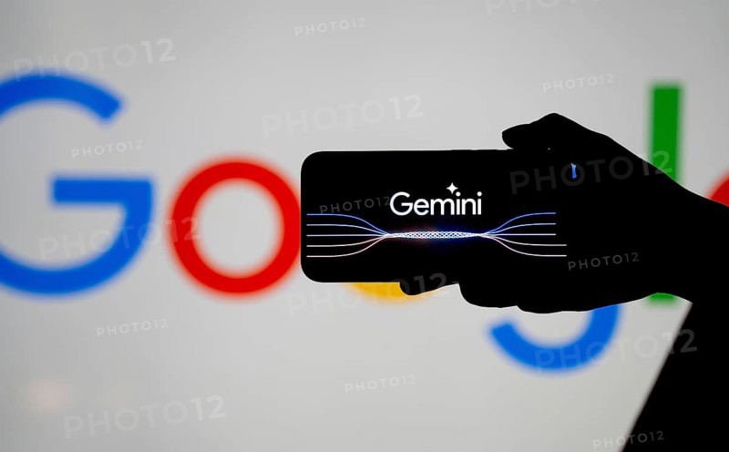 Guwahati, India. 8 December 2023. In this photo illustration a Gemini logo is displayed on a smartphone with Google logo displayed in the background