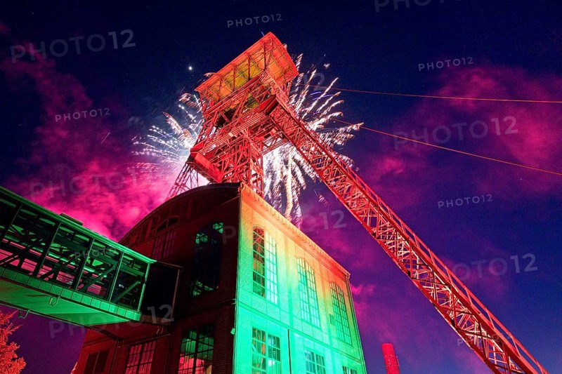 Winding tower of the former Rheinpreussen 4 colliery with fireworks at the Extraschicht, Moers, Ruhr area, North Rhine-Westphalia, Germany, Europe