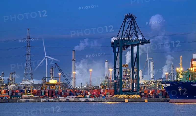 Container terminal showing wharf with stacked containers, gantry crane, portainer crane along the Western Scheldt in Antwerp port, Flanders, Belgium, Europe