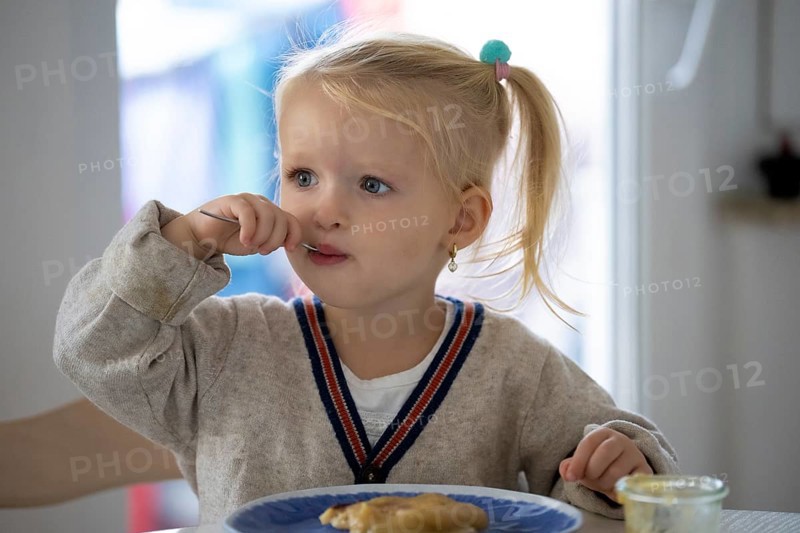 Little girl, 2 years, blonde, eats pancakes, pancake, plate, spoon, eat, Stuttgart, Baden-Württemberg, Germany, Europe