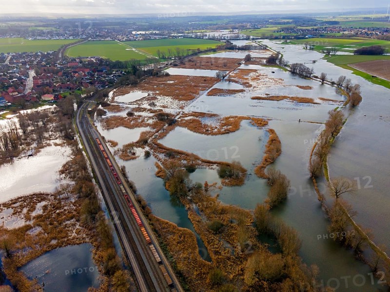 Aerial view of a flooded landscape with railway traffic and winding waterways, flood, Christmas, 2023, Fuhse, Klein Ilsede, Peine, Lower Saxony, Germany, Europe