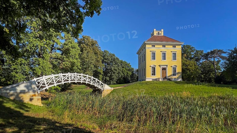 Luisium Palace in the Dessau-Wörlitz Garden Kingdom, White Bridge over the palace pond, Unesco World Heritage Site, summer feeling, holiday destination, sunshine, cultural foundation, Middle Elbe Biosphere Reserve, Saxony-Anhalt, Germany, Europe