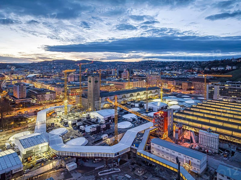 Central station, Stuttgart 21 construction site, the city centre above. The new through station is being built here. Night shot, aerial view, Stuttgart, Baden-Württemberg, Germany, Europe