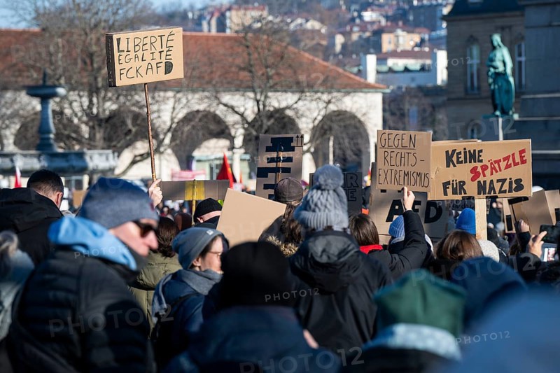 Pictures taken during the demonstration Haltung zeigen! against Nazi deportation plans of the AfD on the Schlossplatz in Stuttgart, 20.01.2024. A sign with the inscription Liberté, Egalité, FCK AFD and Gegen Rechtsextremismus and Keine SpÃ¤tzle für Nazis