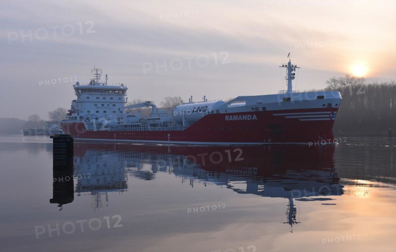 LNG tanker travelling through the Kiel Canal at fog and sunrise, Kiel Canal, Schleswig-Holstein, Germany, Europe