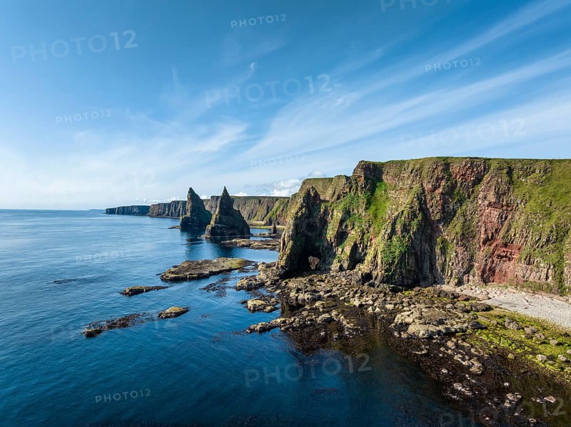 Aerial view of the rugged coastal landscape with the Duncansby Stacks, Duncansby Head coast, County Caithness, Scotland, United Kingdom, Europe