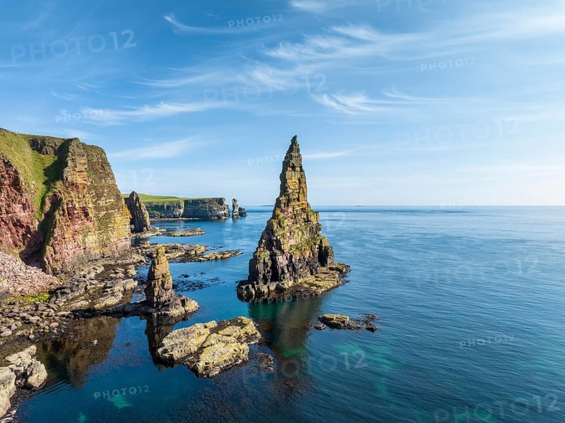 Aerial view of the rugged coastal landscape with the Duncansby Stacks, Duncansby Head coast, County Caithness, Scotland, United Kingdom, Europe