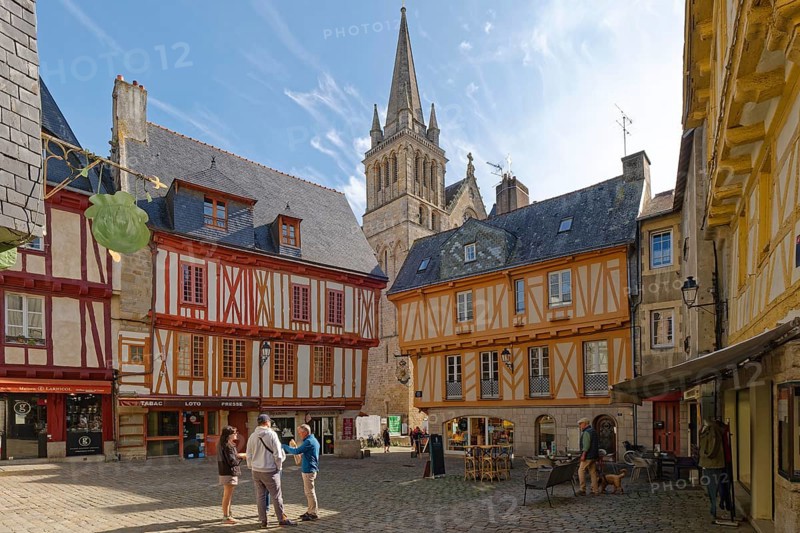 Half-timbered houses on Place Henri IV and the cathedral in the background in the old town of Vannes in Brittany. Vannes, Morbihan, France, Europe