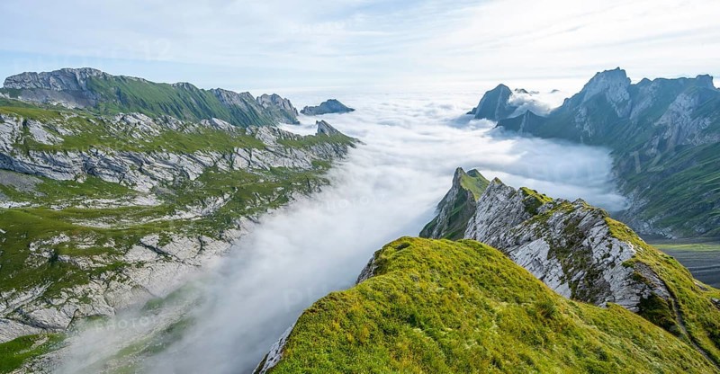 View of mountain peaks above the sea of clouds, SÃ¤ntis mountains and valley of Meglisalp, high fog, Appenzell Ausserrhoden, Appenzell Alps, Switzerland, Europe